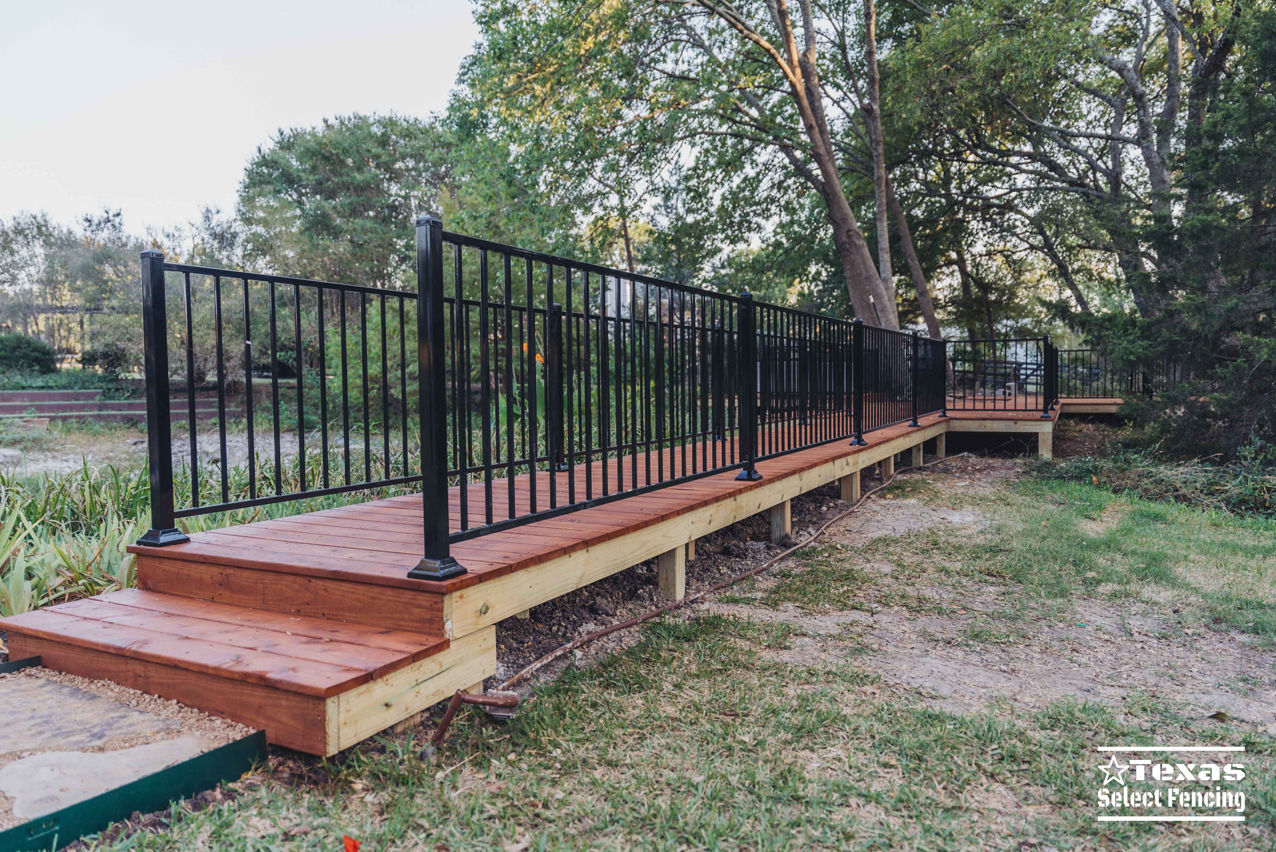 Deck, Automatic Gate, and Flagstone Path in Lavon, Texas