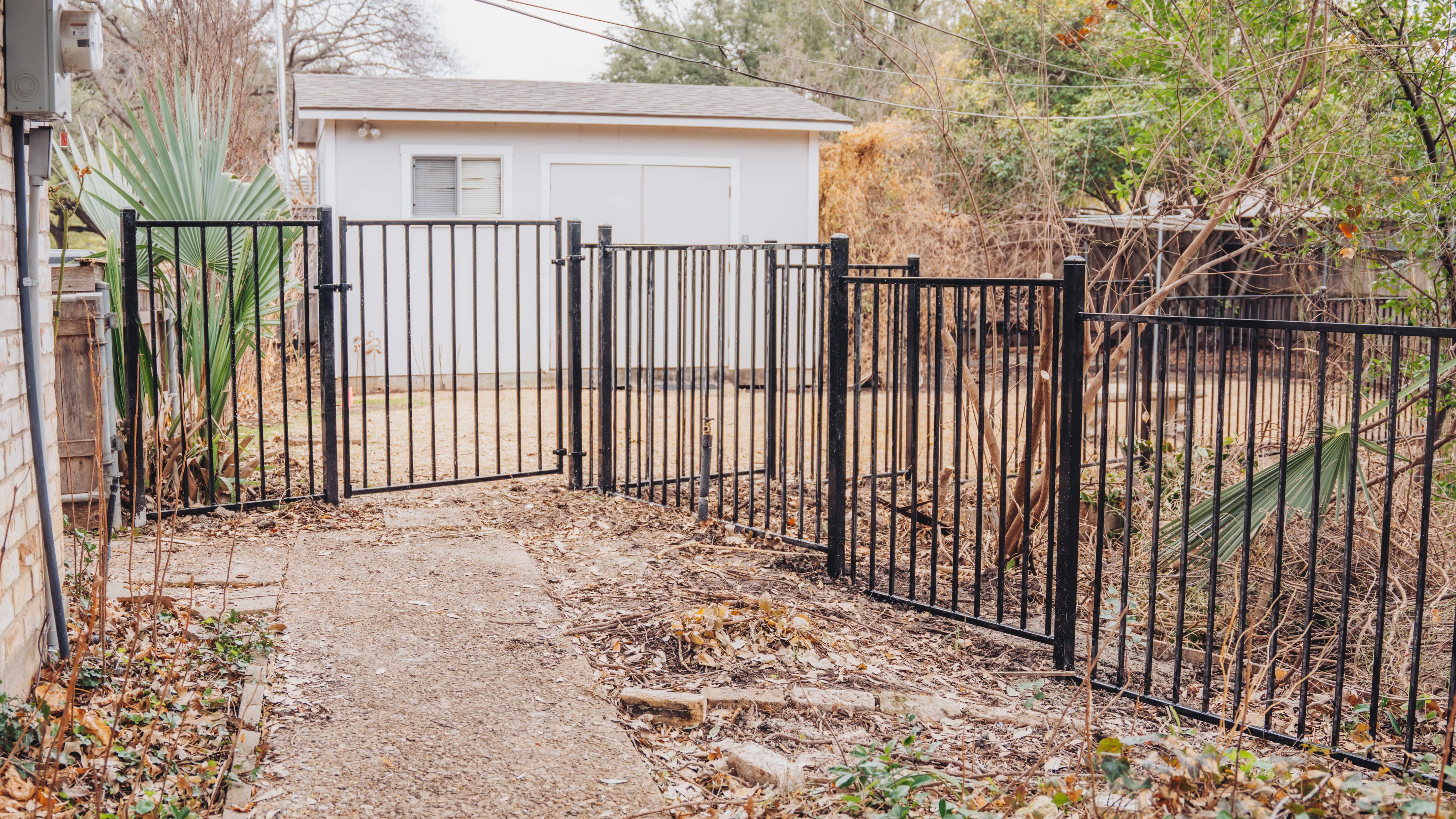 Wood & Wrought Iron Fence Installation In Dallas, Texas