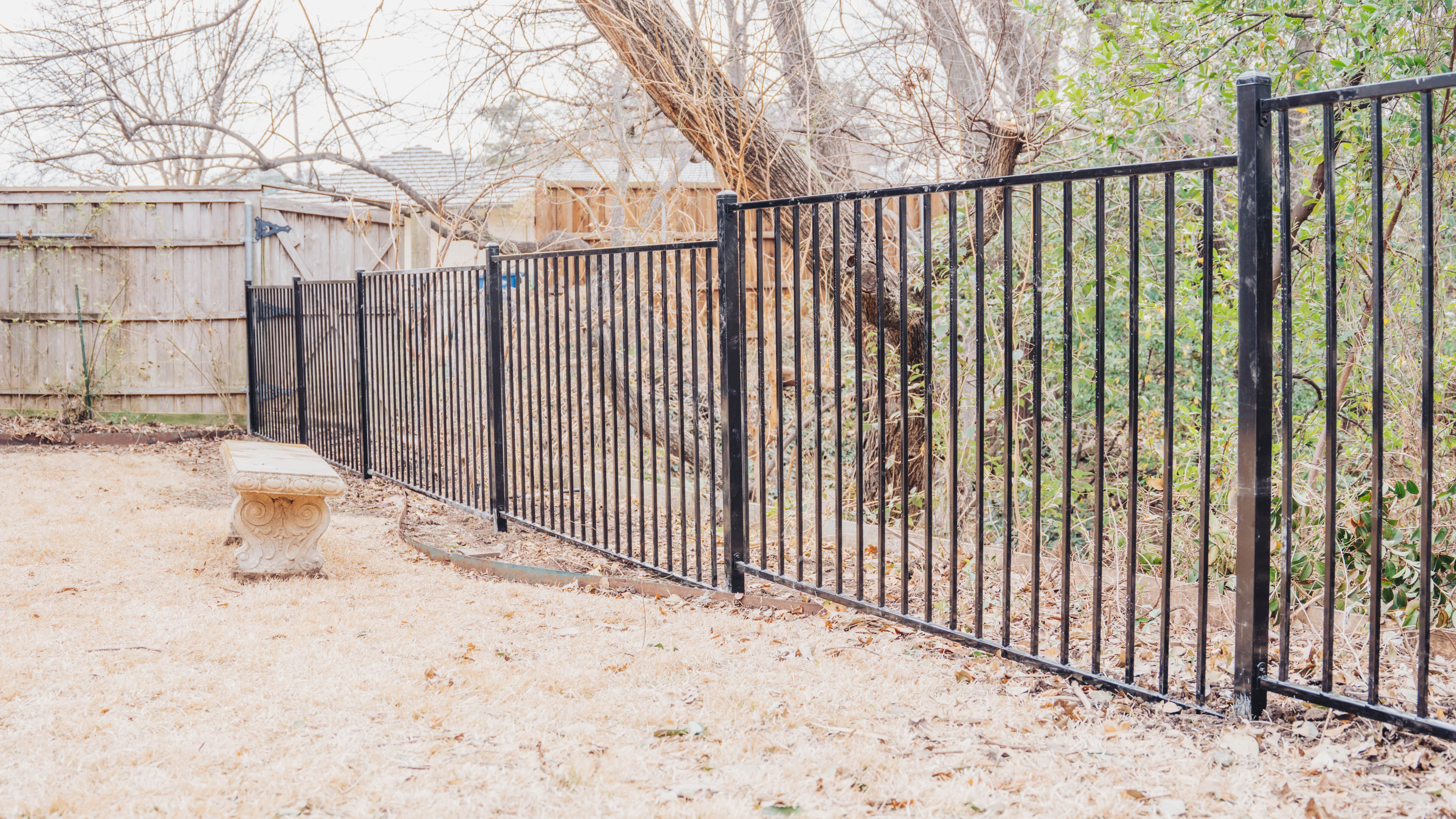 Wood & Wrought Iron Fence Installation In Dallas, Texas