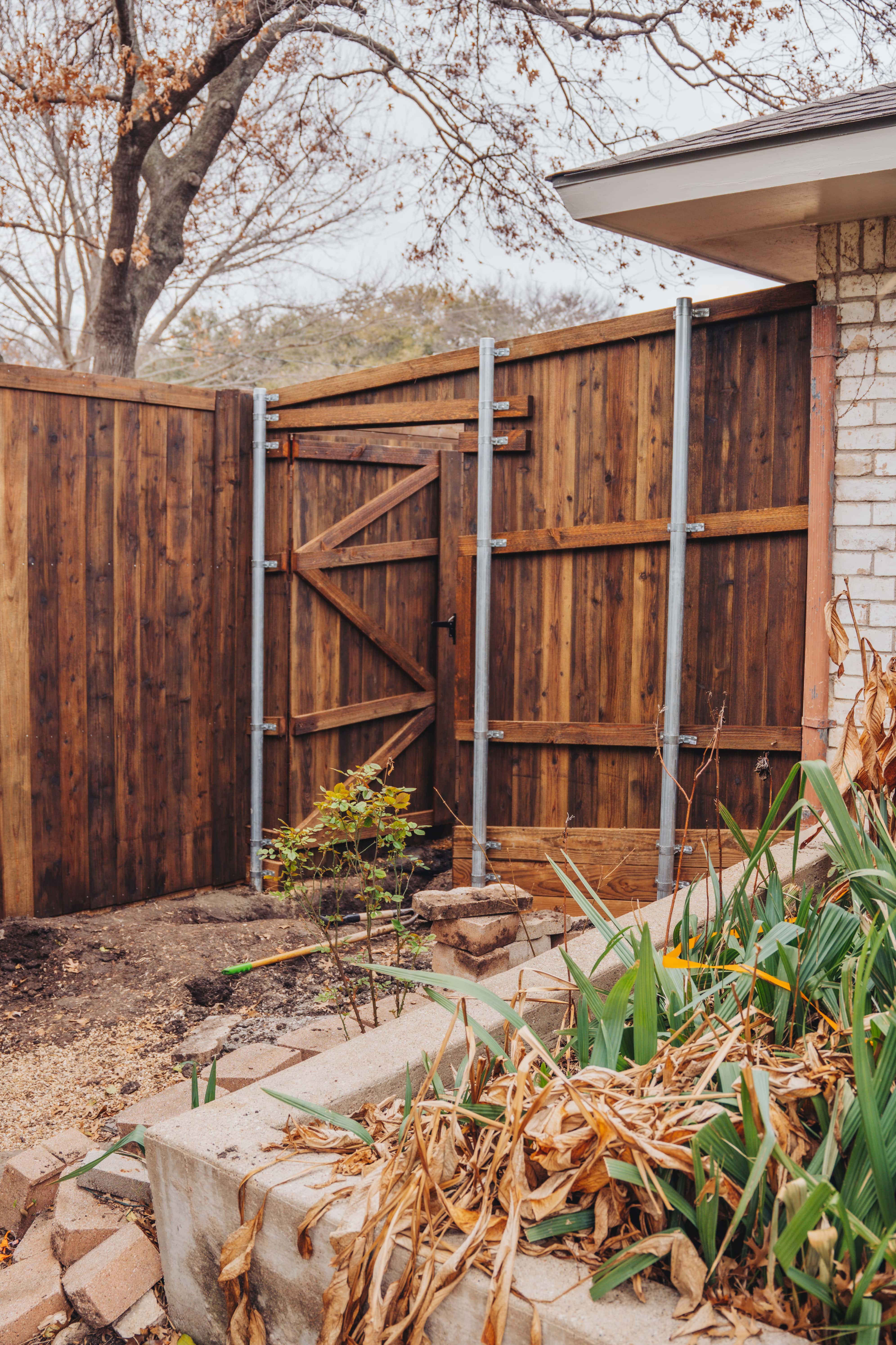 Wood & Wrought Iron Fence Installation In Dallas, Texas