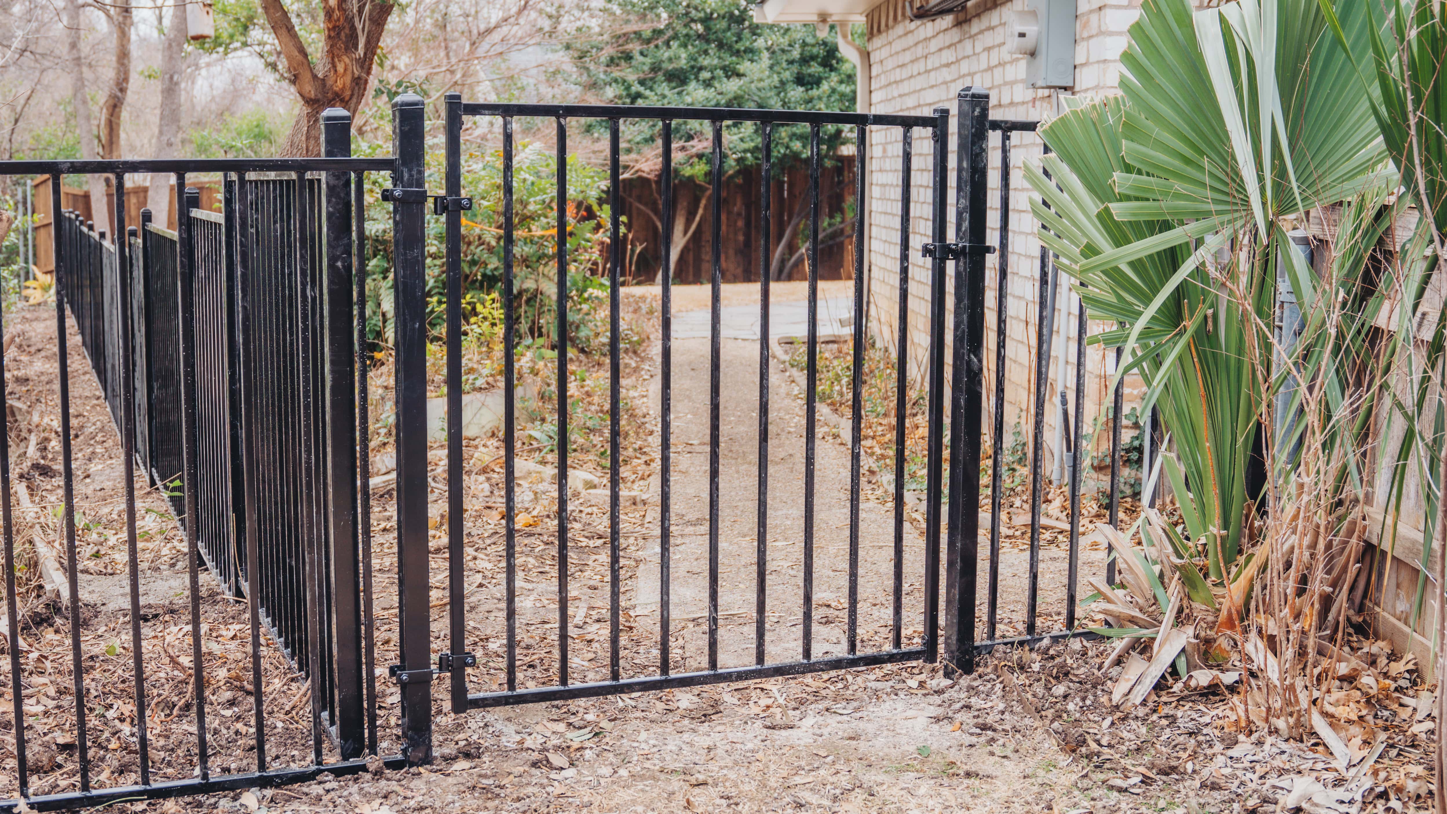 Wood & Wrought Iron Fence Installation In Dallas, Texas