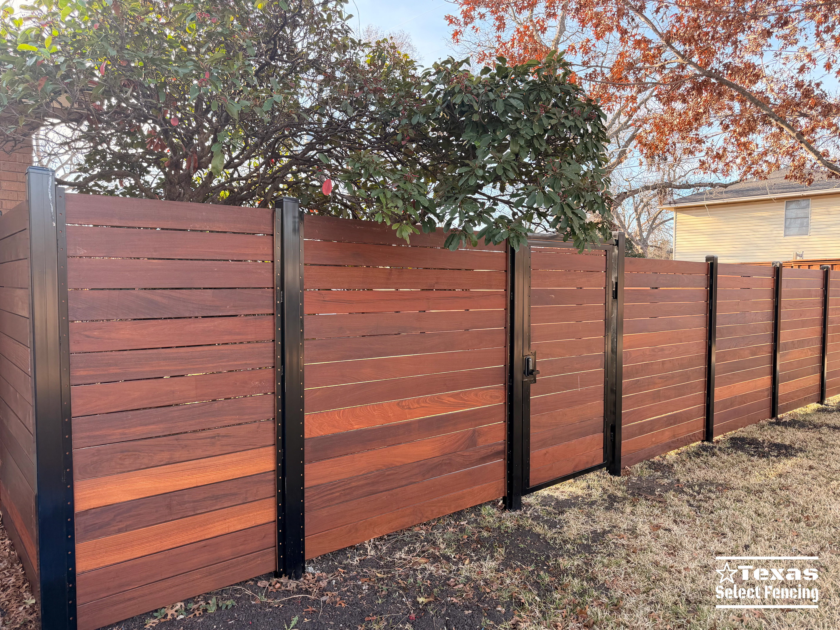 6' Modern Horizontal Brazilian Ipe Fence with Black Metal Posts