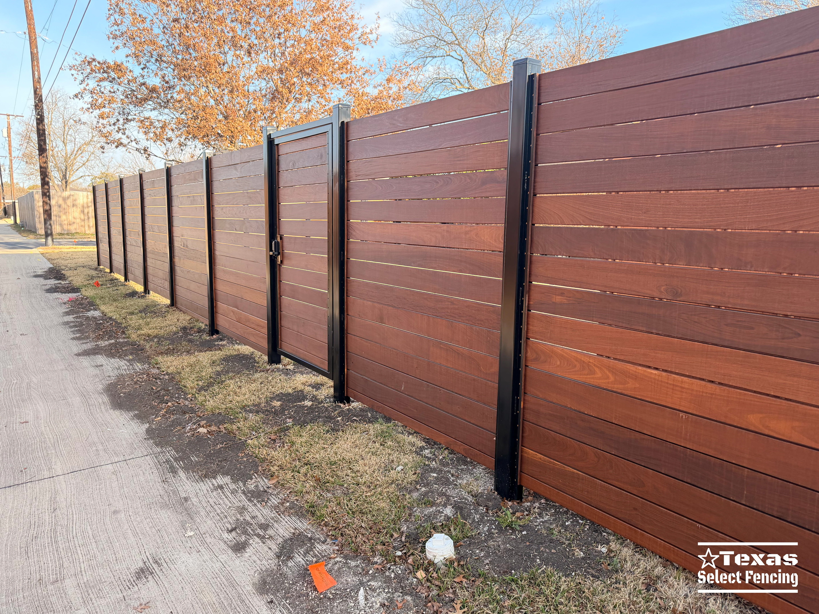 6' Modern Horizontal Brazilian Ipe Fence with Black Metal Posts