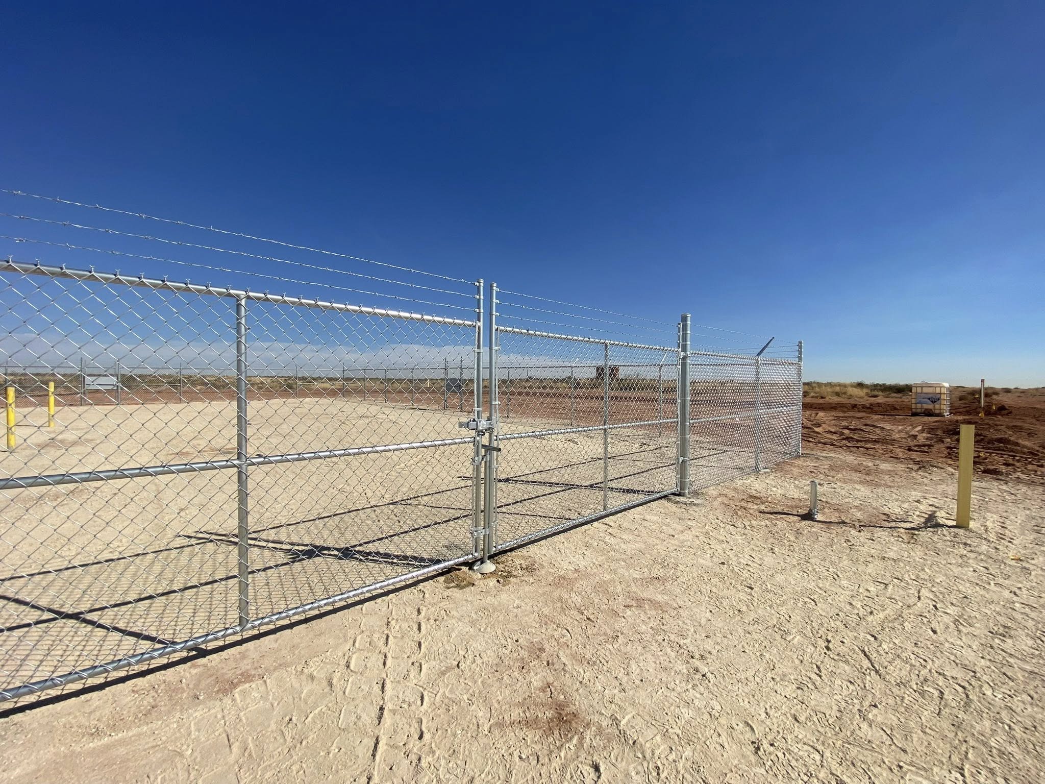 Chain Link Oilfield Fence Installation